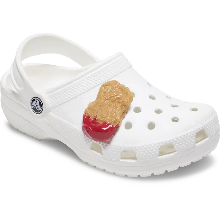 Jibbitz-Anstecker «Hühnchen-Nugget in Ketchup getaucht» Jibbitz-Anstecker «Hühnchen-Nugget in Ketchup getaucht»