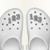 Jibbitz-Schuhanhänger «Ziffer 0» Jibbitz-Schuhanhänger «Ziffer 0»